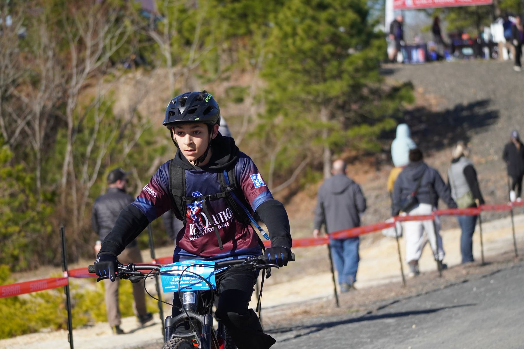 Rider riding through the start area