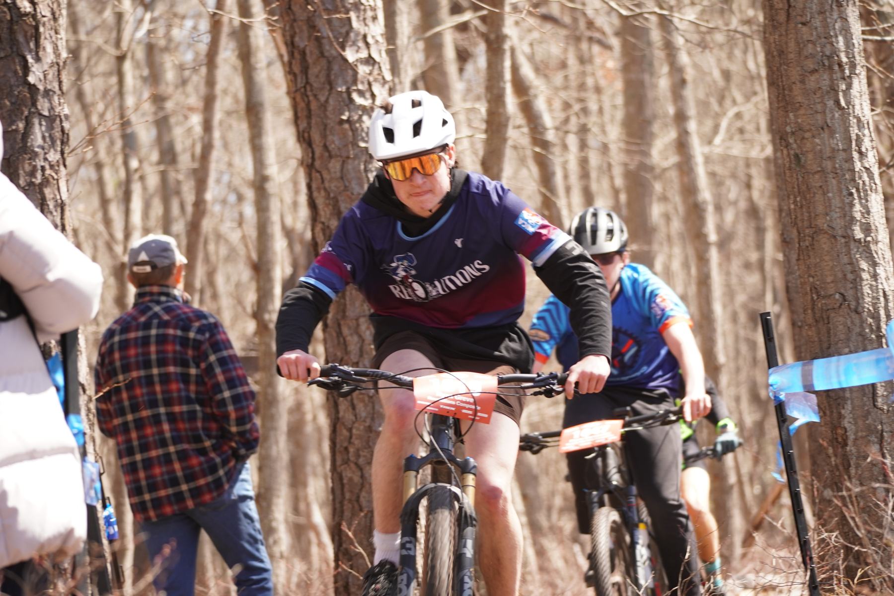 Rider riding towards the camera with the pack behind