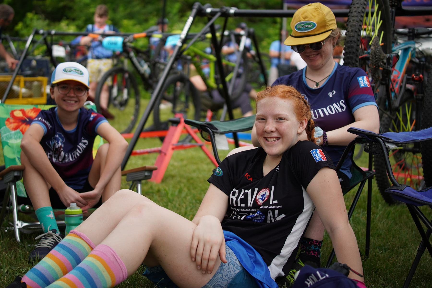 Two riders at the team tent