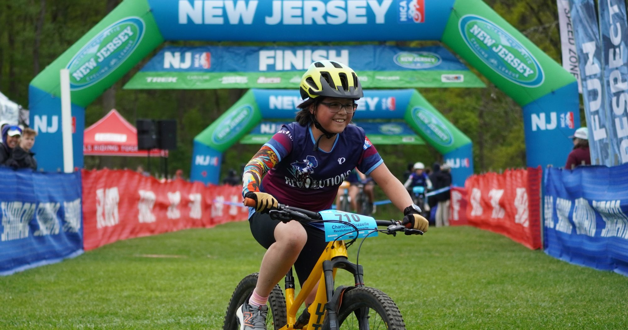 Rider coming through the New Jersey finish arch